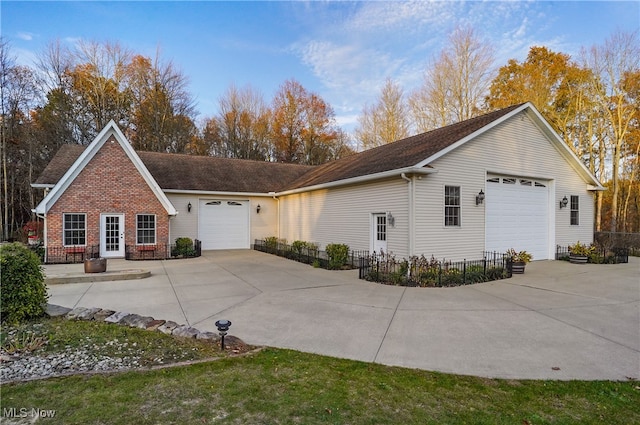 view of front of property with a garage