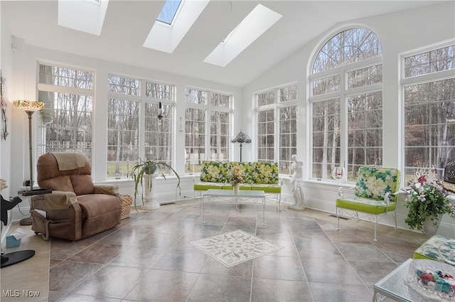 sunroom featuring lofted ceiling