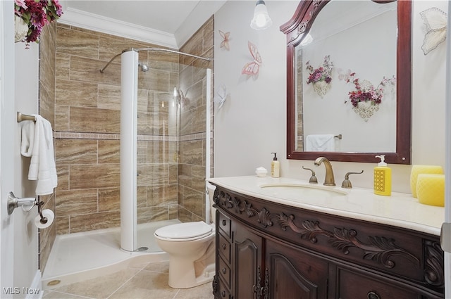 bathroom featuring ornamental molding, walk in shower, vanity, tile patterned flooring, and toilet