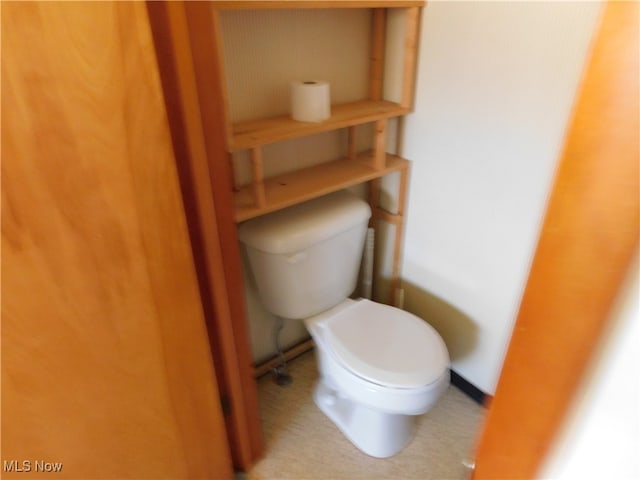 bathroom featuring toilet