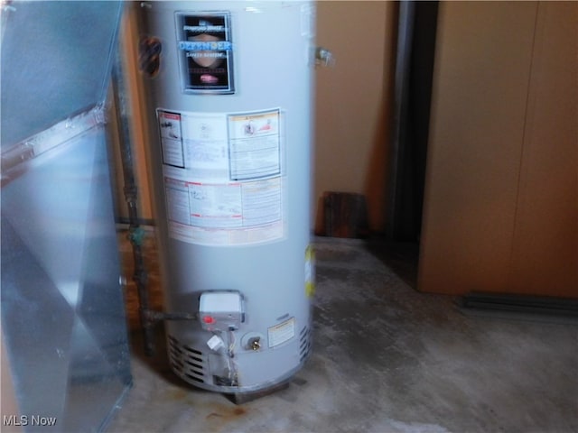 utility room with gas water heater