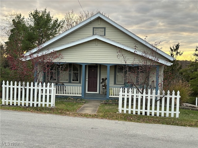 view of front of home featuring covered porch