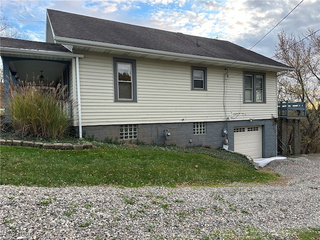 view of side of property featuring a garage