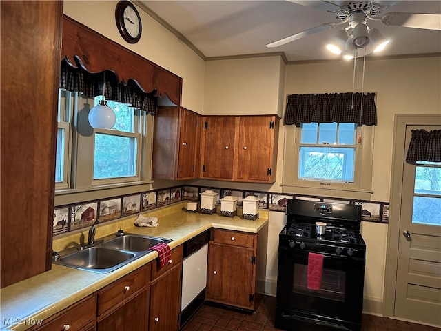 kitchen with white dishwasher, black gas stove, sink, ornamental molding, and ceiling fan