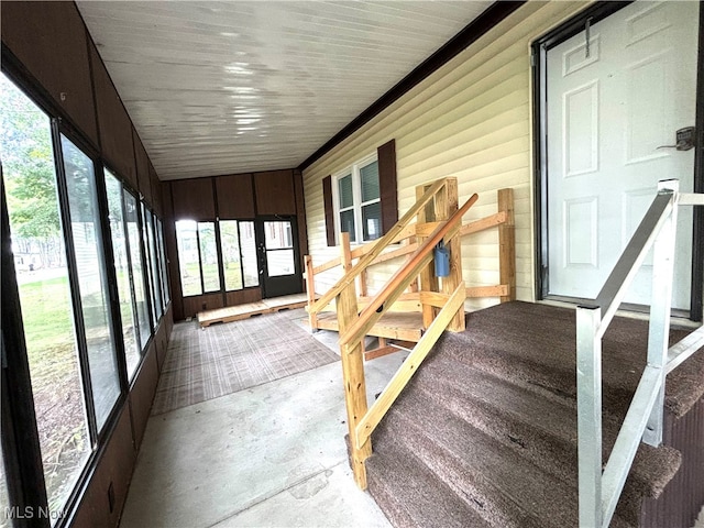 sunroom / solarium featuring plenty of natural light