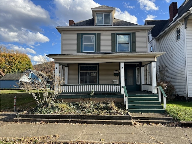 view of property with a porch