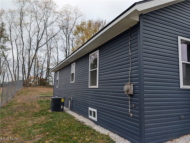 view of home's exterior featuring cooling unit