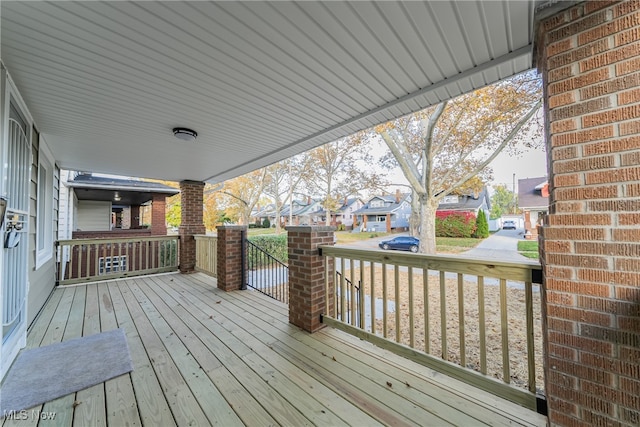 wooden deck featuring a porch