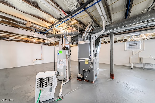 basement with gas water heater and heating unit