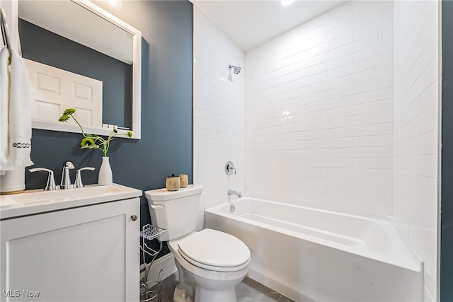 full bathroom with vanity, toilet, and tiled shower / bath