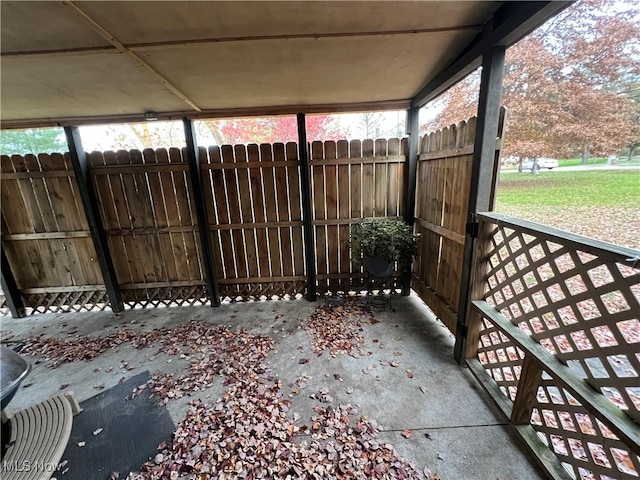 unfurnished sunroom featuring a wealth of natural light