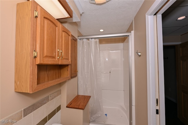 bathroom with a shower with shower curtain