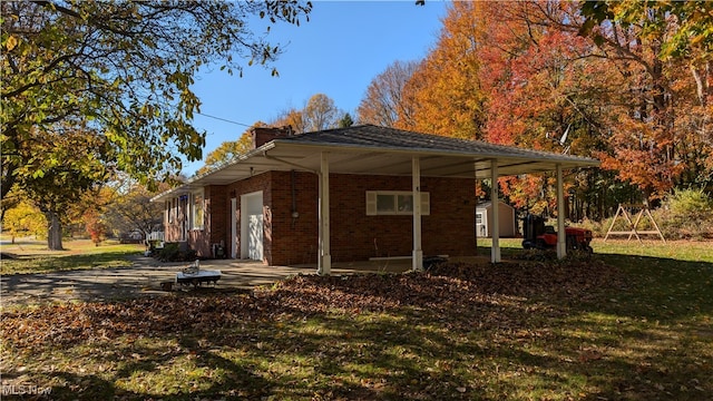 view of home's exterior featuring a yard