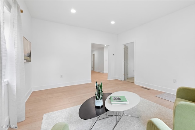 living room with hardwood / wood-style floors