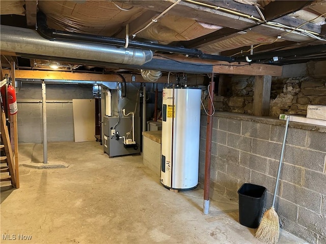 basement with heating unit and electric water heater