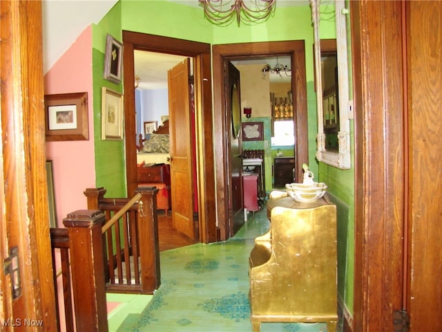 corridor with wood-type flooring