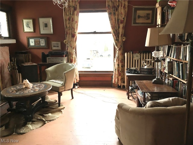 sitting room with light hardwood / wood-style floors