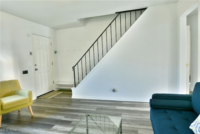 entryway with wood-type flooring