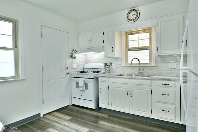 kitchen featuring dark wood-type flooring, white appliances, white cabinetry, and sink