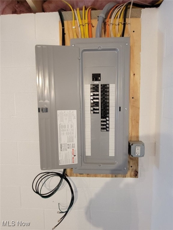 utility room featuring electric panel