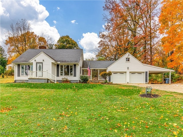 single story home featuring a front lawn, covered porch, a garage, and a carport