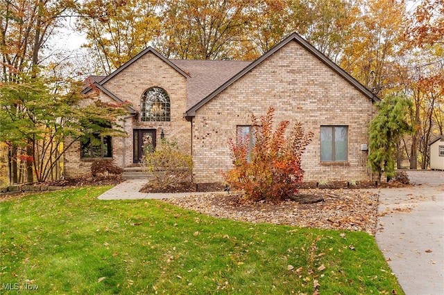 view of front of home with a front yard