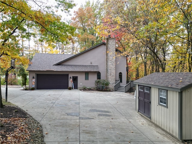 view of side of property featuring a garage