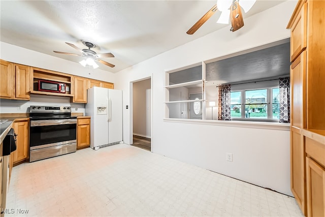 kitchen featuring ceiling fan and appliances with stainless steel finishes