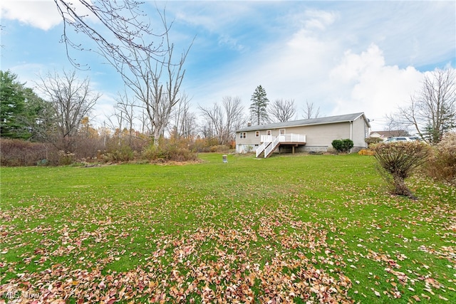 view of yard with a deck