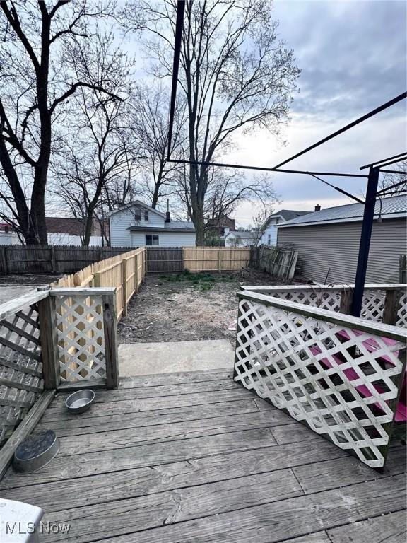 47 Swan St, Geneva, OH 44041 - wooden terrace featuring a fenced backyard
