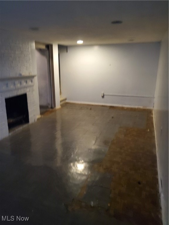 basement with a fireplace