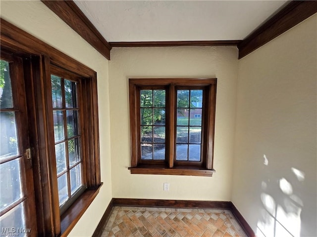 interior space with crown molding