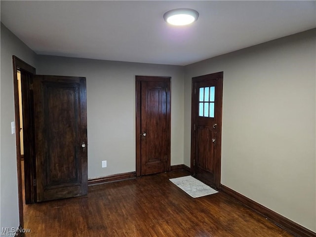 foyer featuring dark hardwood / wood-style floors