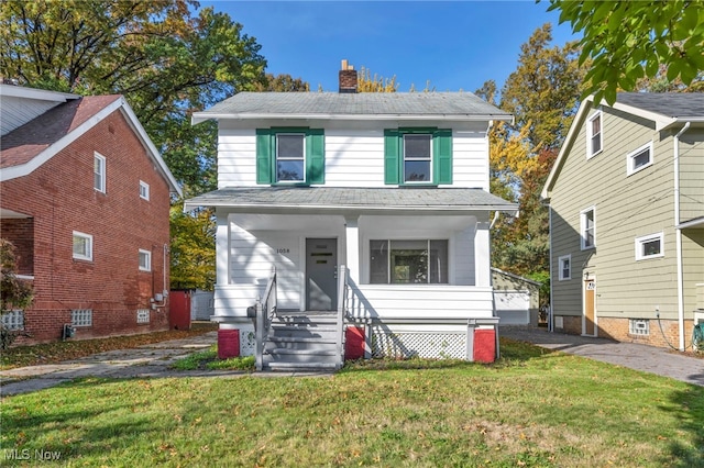 view of property with a porch and a front yard