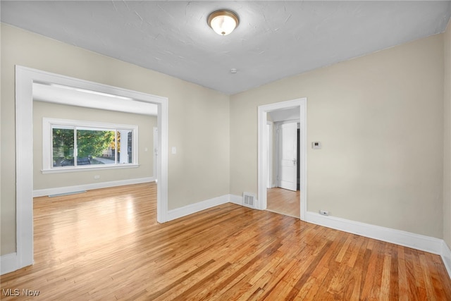 empty room featuring light wood-type flooring