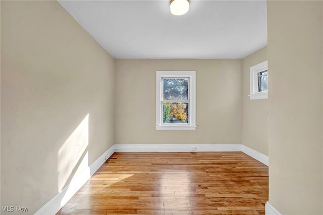 unfurnished room featuring light wood-type flooring