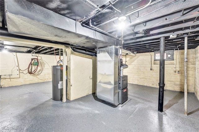 basement with electric water heater and heating unit