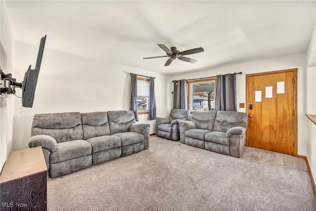 living room with light carpet and ceiling fan