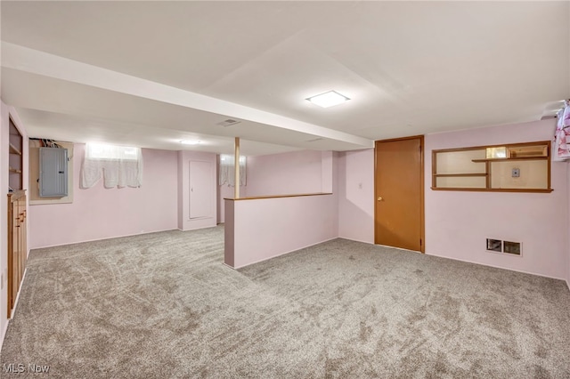 basement with electric panel and carpet floors