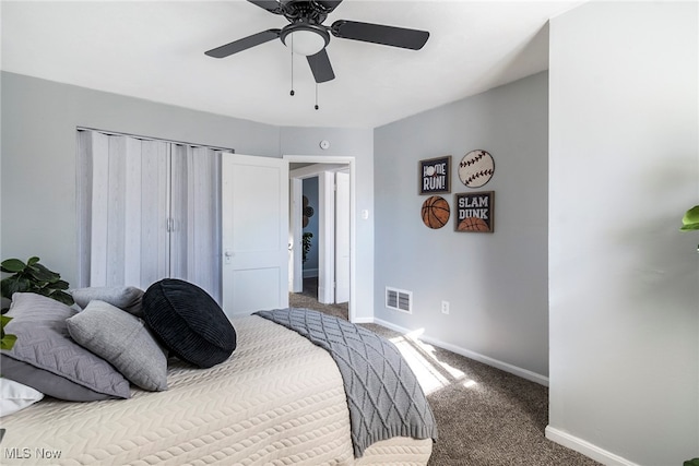 carpeted bedroom with ceiling fan