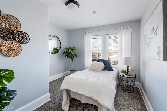 bedroom with dark carpet