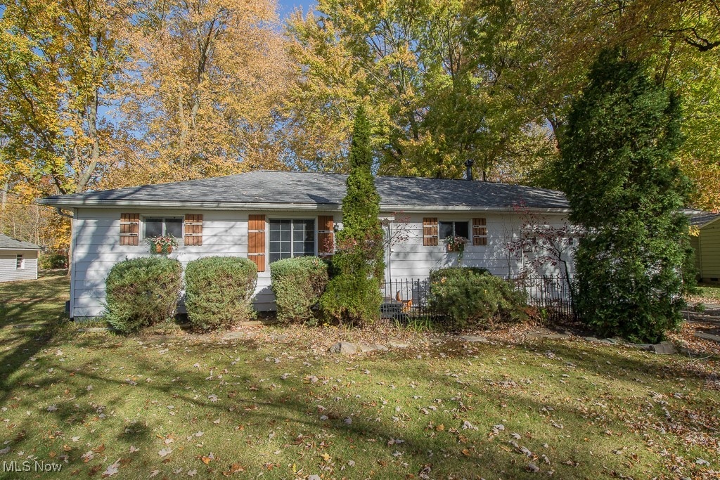 exterior space with a front lawn