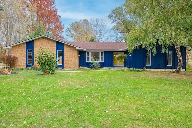 ranch-style house with a front lawn