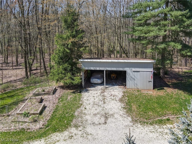 view of outdoor structure with a carport