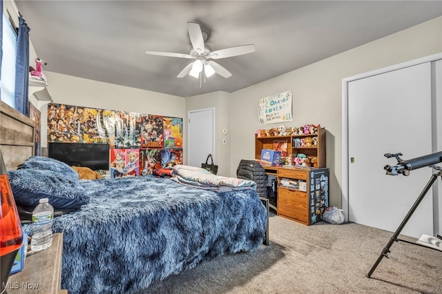 carpeted bedroom with ceiling fan