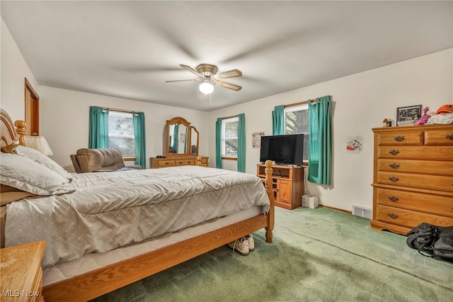 bedroom featuring ceiling fan and carpet floors