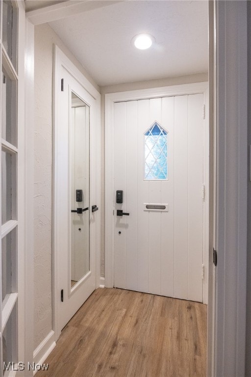 doorway featuring light hardwood / wood-style flooring