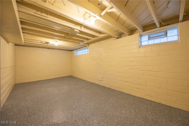 basement featuring plenty of natural light