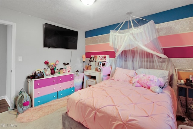 bedroom with a textured ceiling