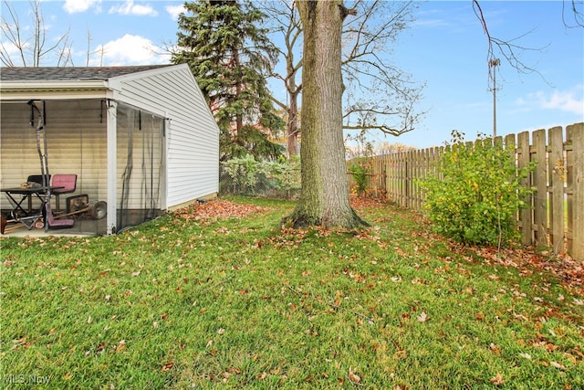 view of yard with a patio and an outdoor structure